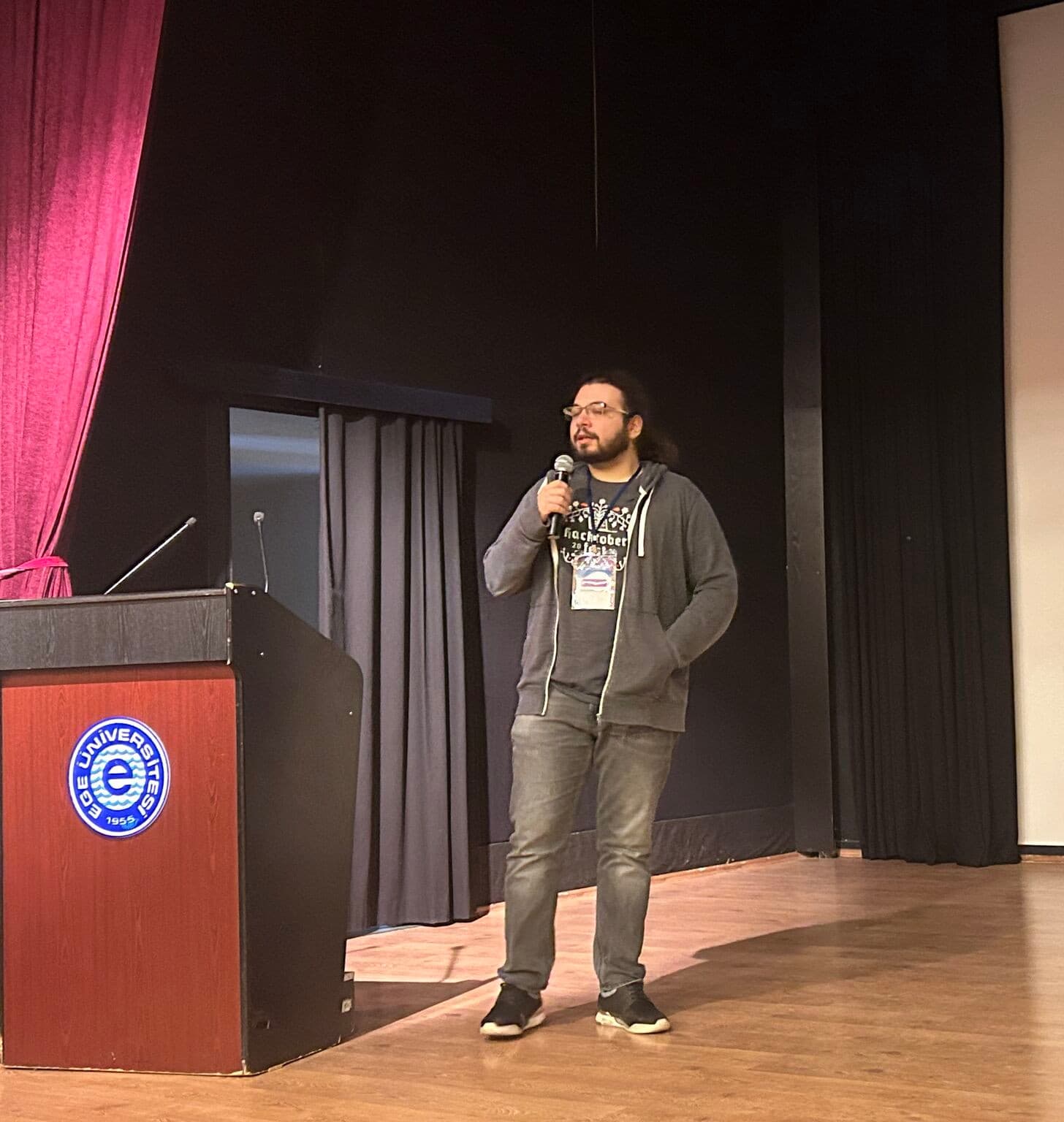 Photo of me giving a cybersecurity presentation at Devfest Izmir 2022